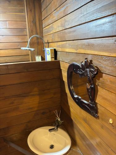 a bathroom with a sink and a faucet at Stay At Lantana Mae Rim in Ban Pa Muang