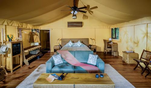 Ένα ή περισσότερα κρεβάτια σε δωμάτιο στο Bagh Villas I Kanha