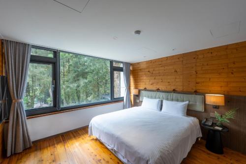 Postel nebo postele na pokoji v ubytování Howard Resort Xitou