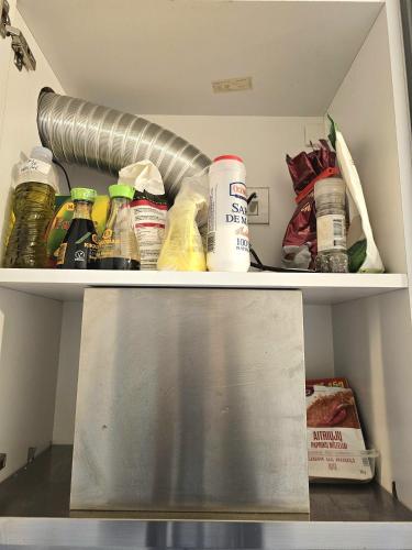 a refrigerator filled with lots of different types of food at Marianne, Apartament 2 Camere, Morii Lake 2 in Bucharest