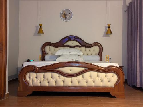 Katil atau katil-katil dalam bilik di hôtel le CALOMA
