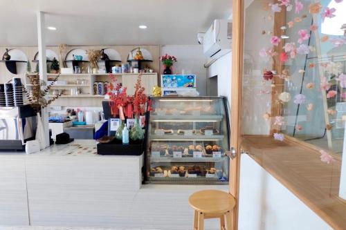 a store with a display case filled with pastries at The Resort Angel Hill in Ban Khlong Phai
