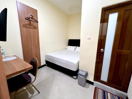 Televisyen dan/atau pusat hiburan di Saranani Guesthouse