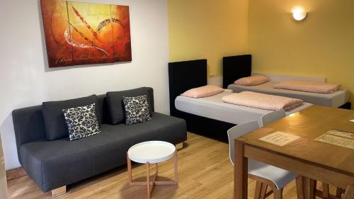 Postel nebo postele na pokoji v ubytování Apartment Metzingen City