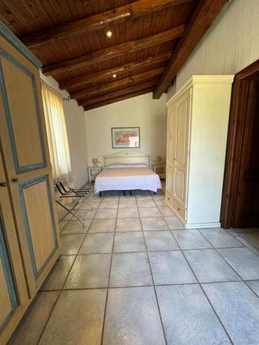 Postel nebo postele na pokoji v ubytování Li Suari Club Village