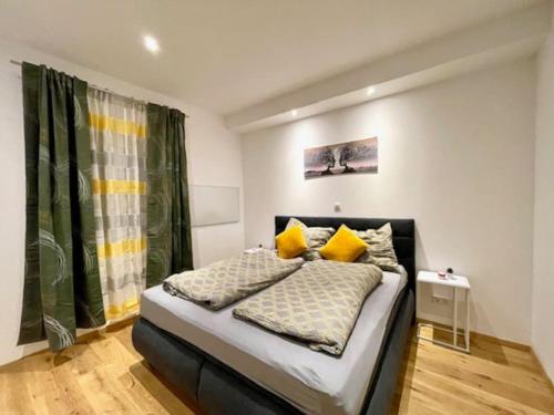 Ένα ή περισσότερα κρεβάτια σε δωμάτιο στο Moderne Stadtwohnung nähe Stadthalle