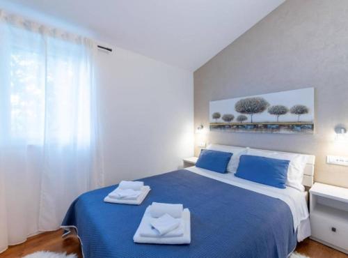 Katil atau katil-katil dalam bilik di Idyllic Escape Villa Maretici with Pool and Private Garden