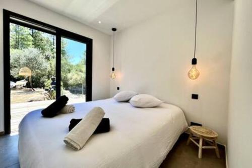 Ένα ή περισσότερα κρεβάτια σε δωμάτιο στο Casa di Macchjerolu - 8 pers