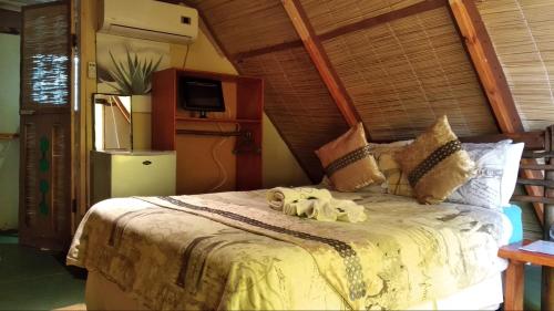 Elephant Trail Guesthouse and Backpackersにあるベッド