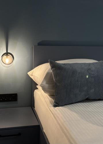 Postel nebo postele na pokoji v ubytování Alinar Oasis Apartments