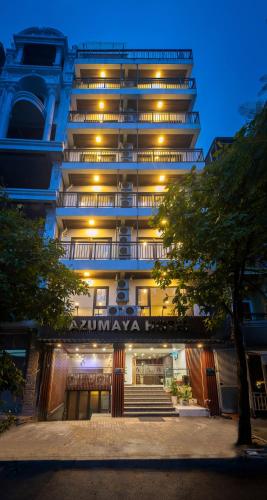 a tall building with a sign that reads amazonatown at Azumaya Kim Mã 3 in Hanoi