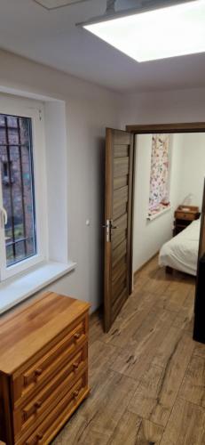 Postel nebo postele na pokoji v ubytování Apartamenty Stadion & Park blisko Centrum Chorzowa