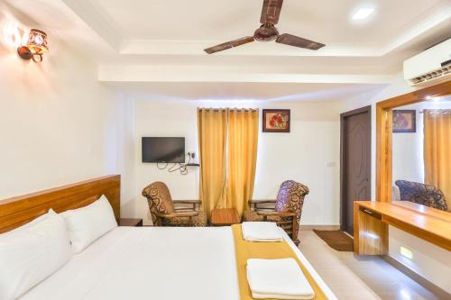 TV a/nebo společenská místnost v ubytování Hotel Golden Bliss