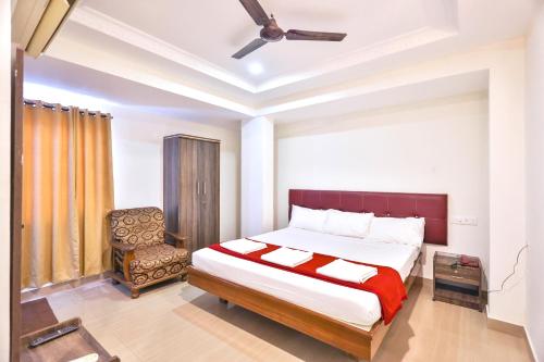 Postel nebo postele na pokoji v ubytování Hotel Golden Bliss