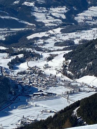 an aerial view of a ski resort in the snow at dorfwerfen137 in Pfarrwerfen