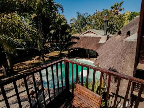 a view of a swimming pool from a balcony at STAY In TEHAMA in Cape Town
