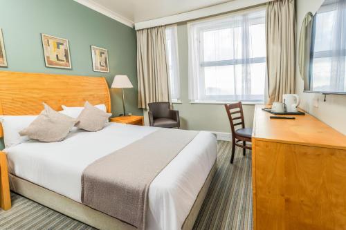 Ένα ή περισσότερα κρεβάτια σε δωμάτιο στο Citrus Hotel Eastbourne by Compass Hospitality