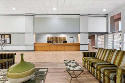 a large lobby with couches and a waiting room at Quality Inn Slidell I-10 in Slidell