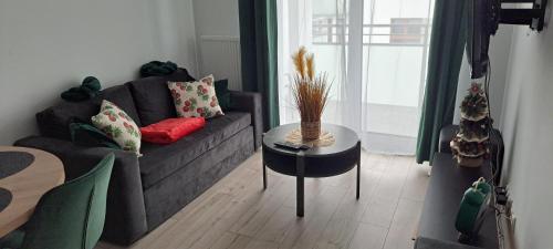 Ein Sitzbereich in der Unterkunft Apartament ROYAL