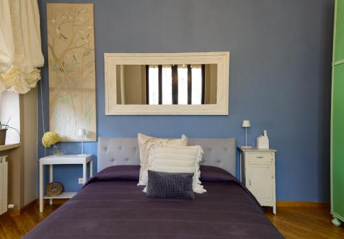Postel nebo postele na pokoji v ubytování Mimma bed&flavour