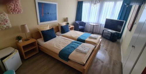 Postel nebo postele na pokoji v ubytování Zak Neuhausen