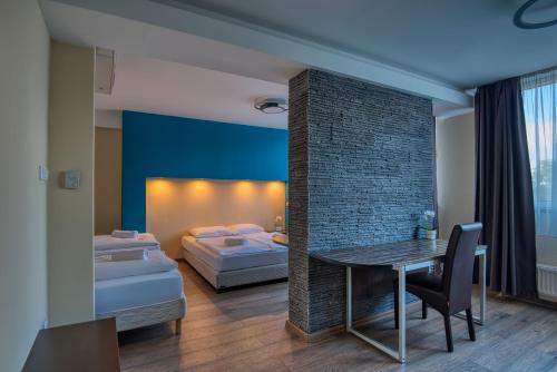 Кровать или кровати в номере City Budget Hotel