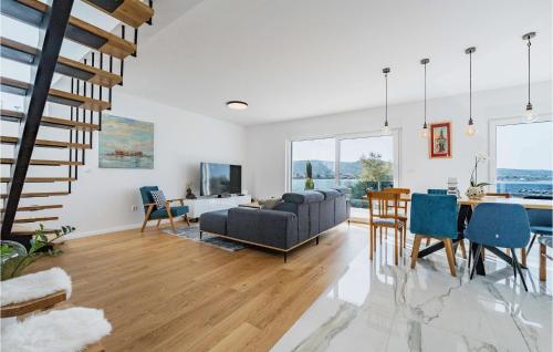 a living room with a couch and a table at Villa Tala in Mrljane