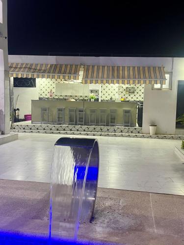 a glass object sitting in front of a building at Résidence Turpin in Toubab Dialaw