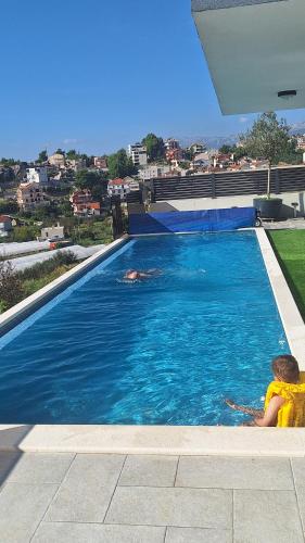 Gallery image of Apartman Oliva and Studio Delux for a family with swiming pool, free parking, terace with view at the sea in Podstrana