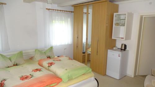 Postel nebo postele na pokoji v ubytování Privatzimmer Lehmann