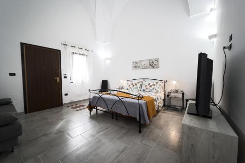 Postel nebo postele na pokoji v ubytování Coraline Home by Vivimy