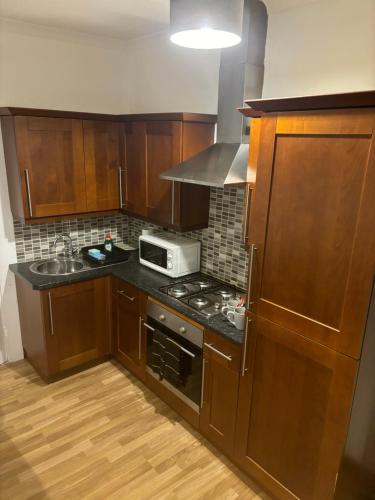 Kuchyň nebo kuchyňský kout v ubytování The garden flat