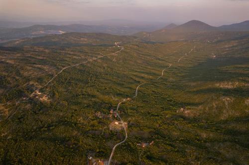 an aerial view of a road in the mountains at Traditional Comfort Casa Natura with 36m2 Pool in Slivno