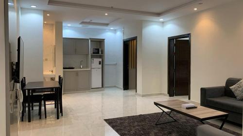 شقق الاكواخ السبعة للشقق المخدومةにあるキッチンまたは簡易キッチン