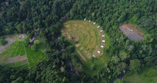 an aerial view of a farm in the middle of a forest at Clio Ella Adventure in Ella