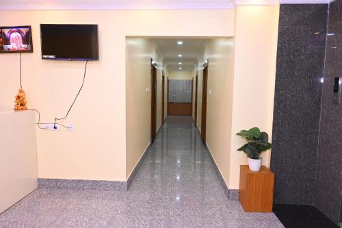 Televisyen dan/atau pusat hiburan di Sai Sudha Homestay