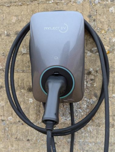 a speaker with a hose hooked up to it at School View Cottage in North Cerney