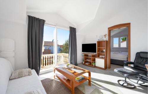 Amazing Apartment In Rogoznica With Lake View