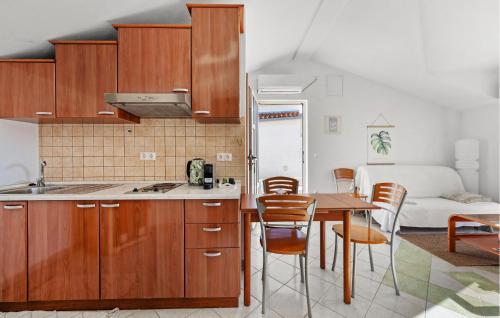 Amazing Apartment In Rogoznica With Lake View