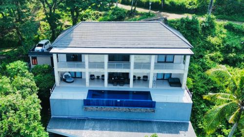 an aerial view of a house with a swimming pool at Villa Skyline Lombok in Lajor