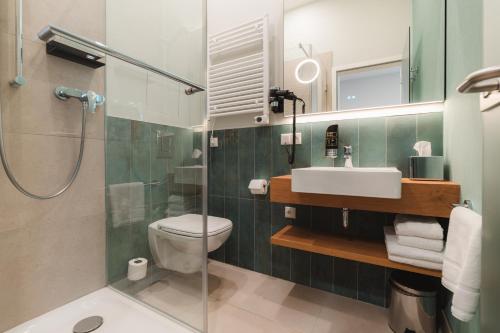 Bilik mandi di H24 Hotel Apartments Eberswalde