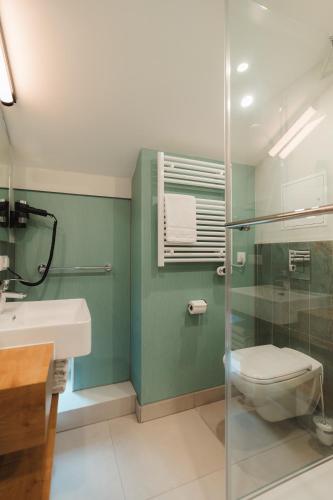 Bilik mandi di H24 Hotel Apartments Eberswalde