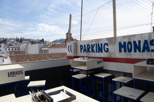 a view of a rooftop with a parking lot at Hotel Monasterio Granada - Adults Only in Granada