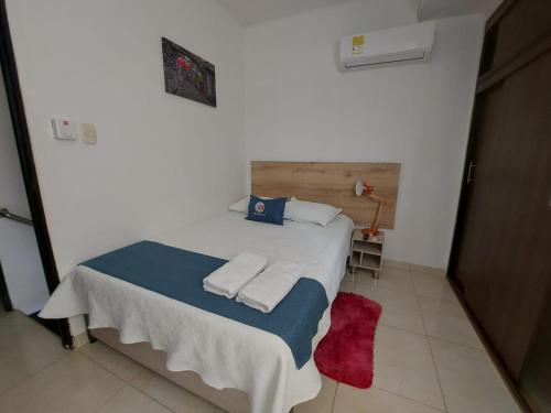 Postel nebo postele na pokoji v ubytování CIC Apartamento amoblado Mirador del Sinú