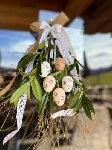 a bunch of eggs in a bundle of grass at Koliba Pod Skalami in Súľov-Hradná