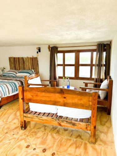 Ένα ή περισσότερα κρεβάτια σε δωμάτιο στο Loft con hermosa vista, terraza y wifi Starlink!