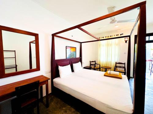 Katil atau katil-katil dalam bilik di Private Villa with a Pool, Beach Front - The White House