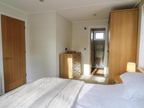 Ένα ή περισσότερα κρεβάτια σε δωμάτιο στο Seren Lodge