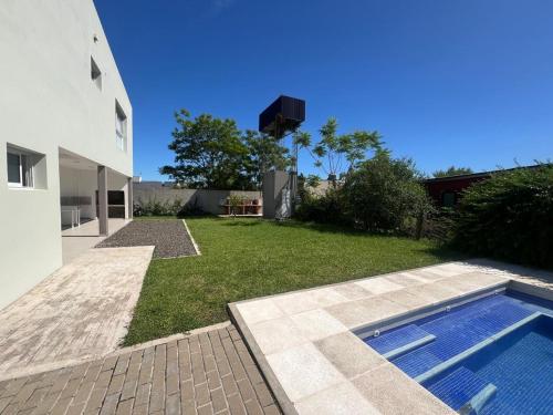 Πισίνα στο ή κοντά στο Duplex con pileta
