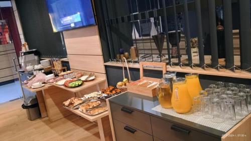a buffet with a bunch of food and drinks at Hotel Dunav in Vidin